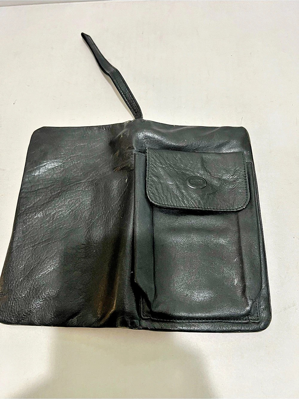 vintage black leather multi-pocket organizer bag or travel clutch